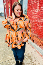Load image into Gallery viewer, In My Thoughts Rust Abstract V Neck Peplum Top