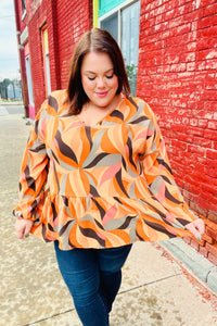 In My Thoughts Rust Abstract V Neck Peplum Top