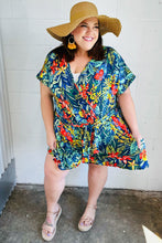 Load image into Gallery viewer, Navy Tropical Floral Surplice Romper